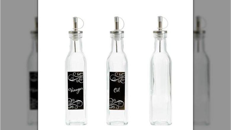Botellas con picos vertedores de metal